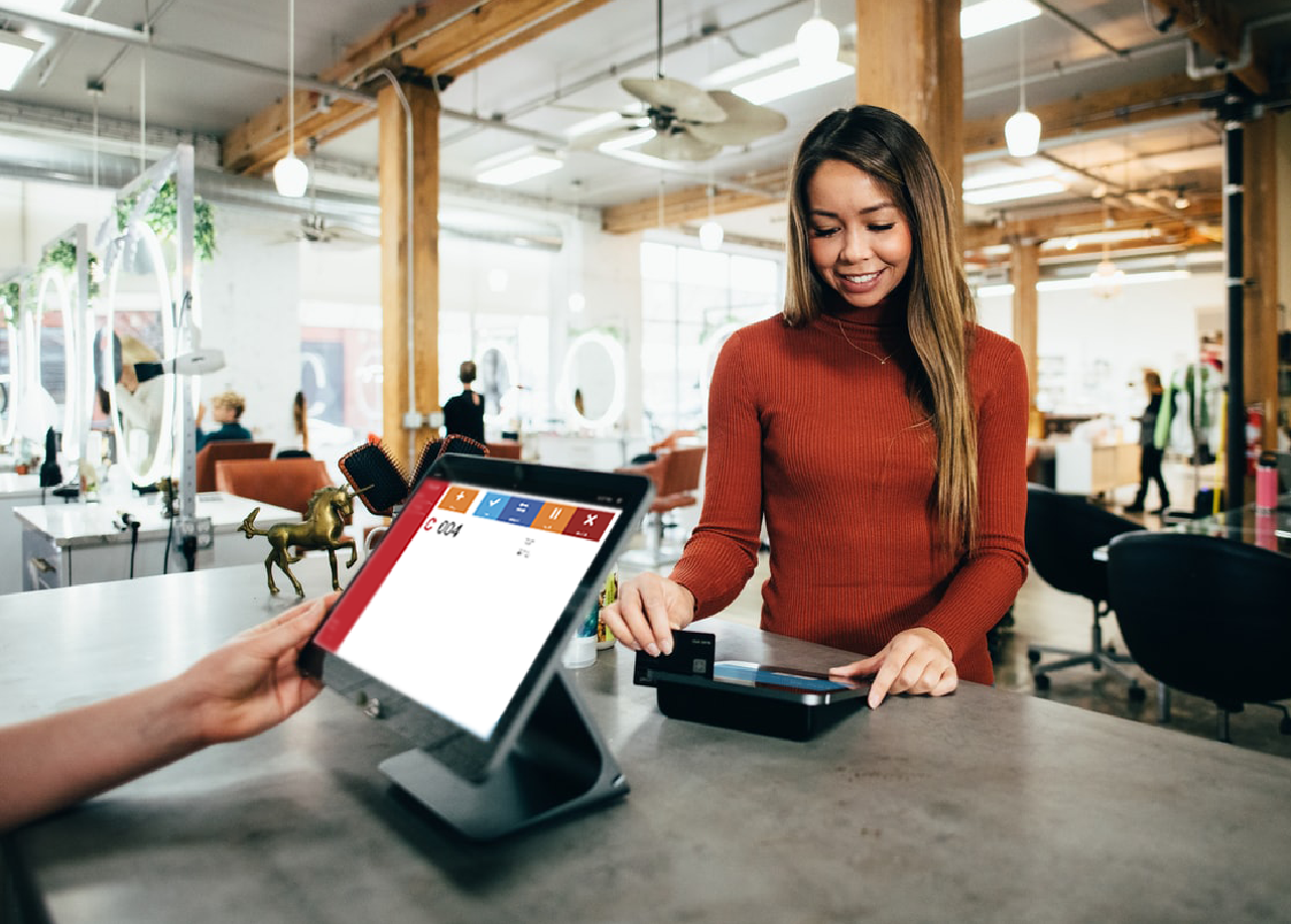 QM-Pad app at a store counter